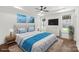 Nicely staged main bedroom with a comfortable bed, soft colors, and a decorative rug at 3907 E Lawyers Rd, Monroe, NC 28110