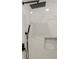 Modern shower features a sleek, matte black shower head and stylish, light marble tiling at 3907 E Lawyers Rd, Monroe, NC 28110