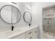 Elegant bathroom with double sinks, sleek fixtures, and a marble-tiled shower, creating a spa-like experience at 4012 Cambridge Hill Ln, Charlotte, NC 28270