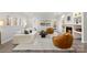 Bright and airy living room featuring a cozy fireplace, built-in shelves, and plush seating for comfortable relaxation at 4012 Cambridge Hill Ln, Charlotte, NC 28270