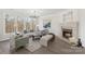 Bright living room boasts a fireplace, large windows, and modern furnishings at 4012 Cambridge Hill Ln, Charlotte, NC 28270
