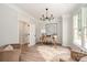 Bright home office with hardwood floors, contemporary desk, and a large window at 4012 Cambridge Hill Ln, Charlotte, NC 28270