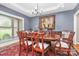 Elegant dining room featuring a large table, beautiful rug, and stylish wall decor at 4205 New Town Rd, Waxhaw, NC 28173