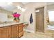 The main bathroom has double vanity, walk-in shower, and separate tub for relaxing at 4205 New Town Rd, Waxhaw, NC 28173