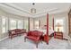 Spacious main bedroom features a tray ceiling, plush carpeting, and plenty of natural light at 4205 New Town Rd, Waxhaw, NC 28173