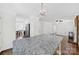Open floor plan from kitchen island with granite countertops leading into dining and living rooms at 4601 Crooked Oak Ln, Charlotte, NC 28226