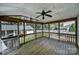 Spacious screened porch with wood ceiling and natural wood posts offering a relaxing outdoor living space at 4601 Crooked Oak Ln, Charlotte, NC 28226