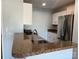Updated kitchen showcasing a stainless steel sink, countertops, and modern appliances at 715 N Church St # 301, Charlotte, NC 28202
