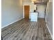 Open living space with plank floors at 715 N Church St # 301, Charlotte, NC 28202