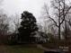 Charming home featuring a covered porch, well-maintained landscaping, and a welcoming façade at 7218 Alexander Farm Rd, Monroe, NC 28110
