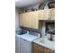 Laundry room featuring cabinetry, a sink, and modern washer and dryer at 7218 Alexander Farm Rd, Monroe, NC 28110