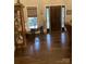 Living room with hardwood floors, furniture, and natural light at 7218 Alexander Farm Rd, Monroe, NC 28110