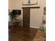 Living room with barn door, hardwood floors and decor at 7218 Alexander Farm Rd, Monroe, NC 28110