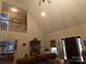 Spacious living room with an open floor plan, vaulted ceilings, a staircase and comfortable seating at 7218 Alexander Farm Rd, Monroe, NC 28110