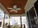 Covered porch featuring dual ceiling fans, wood columns, and wood ceiling at 7218 Alexander Farm Rd, Monroe, NC 28110