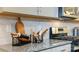 Modern kitchen with granite countertops, stainless steel appliances, and stylish backsplash at 7869 Iron Rd, Sherrills Ford, NC 28673