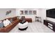 Spacious living area featuring a comfortable brown sectional sofa and stylish decor, perfect for relaxation at 7869 Iron Rd, Sherrills Ford, NC 28673