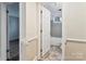 Bathroom featuring a tiled shower and classic fixtures, providing a functional and clean space at 813 North Ave, Charlotte, NC 28208