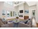 Bright living room with fireplace, lake view, and comfortable seating at 8813 Graham Rd, Denver, NC 28037