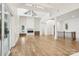 Spacious living room featuring high ceilings, fireplace, and abundant natural light at 8813 Graham Rd, Denver, NC 28037