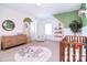 Charming Bedroom with colorful decor, a cozy crib, and comfortable furnishings creating a warm atmosphere at 9007 Raven Top Dr, Mint Hill, NC 28227