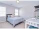 Calm bedroom featuring a large bed and bright natural light at 9007 Raven Top Dr, Mint Hill, NC 28227