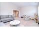 Spacious bonus room offering flexible living space with comfortable seating, a play area and natural light at 9007 Raven Top Dr, Mint Hill, NC 28227