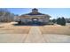 Inviting community center with manicured landscaping and gated entrance, perfect for neighborhood gatherings at 9007 Raven Top Dr, Mint Hill, NC 28227