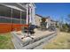 Spacious outdoor patio with dining and lounging areas, perfect for entertaining and relaxation at 9007 Raven Top Dr, Mint Hill, NC 28227
