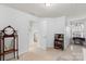 Carpeted bedroom featuring an antique vanity and bookshelf at 9017 Lanark Ln, Fort Mill, SC 29707