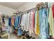 Walk-in closet with ample hanging space and storage shelves, providing optimal organization at 9017 Lanark Ln, Fort Mill, SC 29707