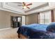Spacious main bedroom featuring a tray ceiling, soft carpet, and a large window for natural light at 9113 Cinder Ln, Huntersville, NC 28078