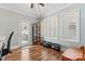 Bright sun room with multiple windows, access to the outdoors, and ample natural light at 9113 Cinder Ln, Huntersville, NC 28078
