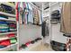 Well-organized walk-in closet with shelves, hanging rods and ample storage space for clothes and shoes at 9113 Cinder Ln, Huntersville, NC 28078