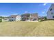 Expansive backyard with a gazebo and ample space, providing an ideal setting for outdoor enjoyment at 9937 Travertine Trl, Davidson, NC 28036