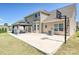 Large backyard with a patio, gazebo and a basketball hoop, perfect for outdoor activities and relaxation at 9937 Travertine Trl, Davidson, NC 28036