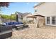 Beautiful backyard with a paver patio, outdoor seating area, and pergola at 11523 Warfield Ave, Huntersville, NC 28078