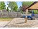 Stone patio with a seating area under a gazebo and steps that lead up to an additional seating area at 11523 Warfield Ave, Huntersville, NC 28078