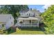 An elevated shot of the house and its fenced-in yard, complete with a detached garage at 127 Charlotte St, Mooresville, NC 28115