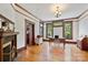 Spacious home office features hardwood floors, natural light, and vintage trim at 127 Charlotte St, Mooresville, NC 28115