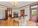 Bright office features hardwood floors, natural light, and detailed trim, ideal for remote work at 127 Charlotte St, Mooresville, NC 28115