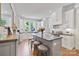 Bright and spacious kitchen featuring a center island, hardwood floors, and stainless steel appliances at 127 Charlotte St, Mooresville, NC 28115