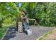 Backyard playground with a slide, climbing wall, and swings for Gathering fun at 127 Charlotte St, Mooresville, NC 28115