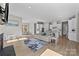 Open concept floor plan features a living room, dining area, and modern kitchen at 197 Tetcott St, Mooresville, NC 28115