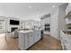 Open-concept kitchen with stainless steel appliances and a center island at 197 Tetcott St, Mooresville, NC 28115