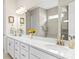 Elegant bathroom with double sinks, a large mirror, and ample counter space at 197 Tetcott St, Mooresville, NC 28115