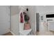 Stylish entryway featuring a built-in bench with coat hooks and decor at 197 Tetcott St, Mooresville, NC 28115