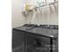 Clean laundry room showcasing black washer and dryer and storage space at 197 Tetcott St, Mooresville, NC 28115