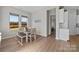 Cozy dining area with natural light and view of the backyard at 197 Tetcott St, Mooresville, NC 28115