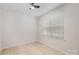 Bedroom with a ceiling fan, large window and hardwood floors at 2039 Morning Gold Dr, Maiden, NC 28650